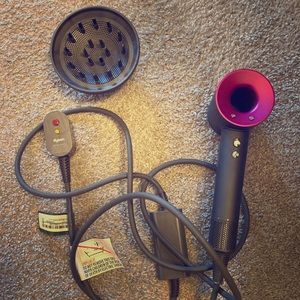 Dyson Supersonic™ hair dryer in iron/fuchsia